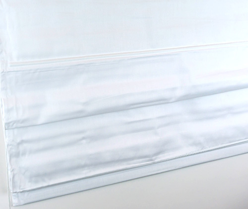 Detailfoto van het vouwgordijn wit